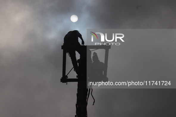 The Voladores of Cuetzalan perform a pre-Hispanic ritual ceremony that involves tying their feet with ropes and launching themselves into th...