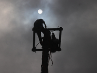 The Voladores of Cuetzalan perform a pre-Hispanic ritual ceremony that involves tying their feet with ropes and launching themselves into th...