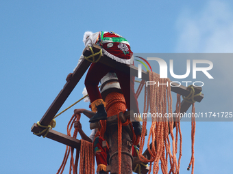 The Voladores of Cuetzalan perform a pre-Hispanic ritual ceremony that involves tying their feet with ropes and launching themselves into th...