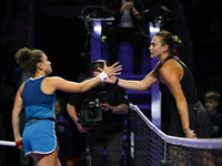 RIYADH, SAUDI ARABIA - NOVEMBER 04: Jasmine Paolini (L) of Italy congratulates Aryna Sabalenka of Belarus at the end of their match on day 3...