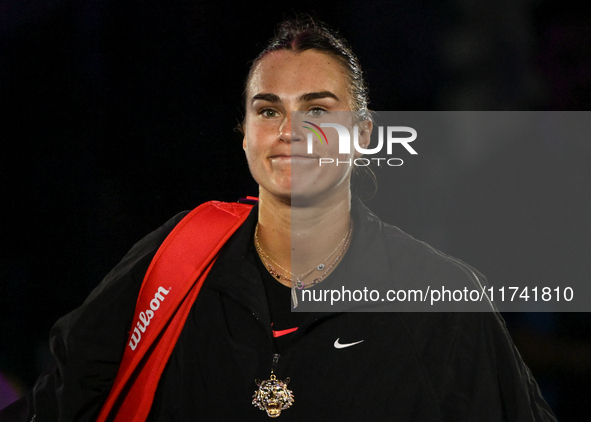 RIYADH, SAUDI ARABIA - NOVEMBER 04: Aryna Sabalenka of Belarus, wearing a tiger-themed brooch, seen after her match against Jasmine Paolini...