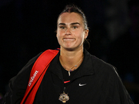 RIYADH, SAUDI ARABIA - NOVEMBER 04: Aryna Sabalenka of Belarus, wearing a tiger-themed brooch, seen after her match against Jasmine Paolini...