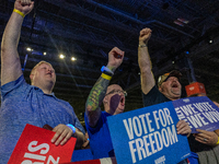 Minnesota Governor and Democratic VP candidate Tim Walz is welcomed by the crowd in Milwaukee, Wisconsin, on november 04, 2024. (