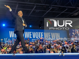 Minnesota Governor and Democratic VP candidate Tim Walz is welcomed by the crowd in Milwaukee, Wisconsin, on november 04, 2024. (