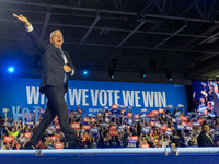 Minnesota Governor and Democratic VP candidate Tim Walz is welcomed by the crowd in Milwaukee, Wisconsin, on november 04, 2024. (