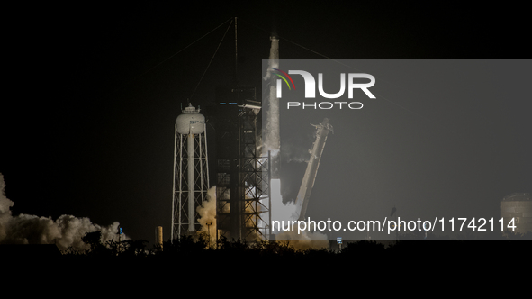 The SpaceX CRS-31 Falcon 9 rocket launches from Kennedy Space Center in Florida, USA. 