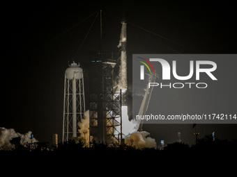 The SpaceX CRS-31 Falcon 9 rocket launches from Kennedy Space Center in Florida, USA. (