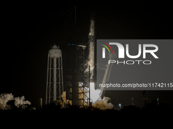 The SpaceX CRS-31 Falcon 9 rocket launches from Kennedy Space Center in Florida, USA. (