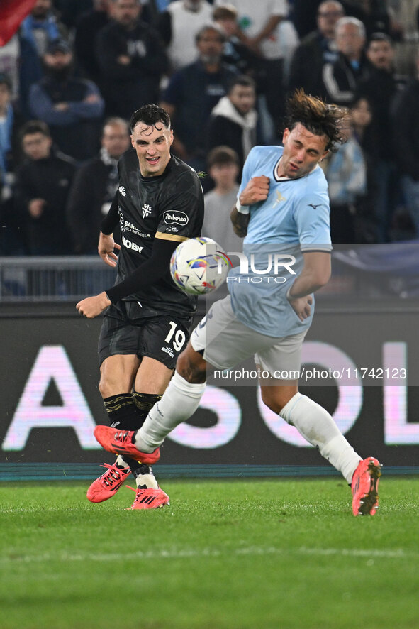 Nadir Zortea of Cagliari Calcio and Luca Pellegrini of S.S. Lazio are in action during the 11th day of the Serie A Championship between S.S....