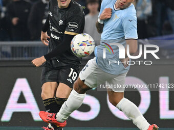 Nadir Zortea of Cagliari Calcio and Luca Pellegrini of S.S. Lazio are in action during the 11th day of the Serie A Championship between S.S....