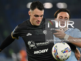 Nadir Zortea of Cagliari Calcio and Luca Pellegrini of S.S. Lazio are in action during the 11th day of the Serie A Championship between S.S....