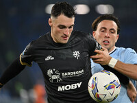 Nadir Zortea of Cagliari Calcio and Luca Pellegrini of S.S. Lazio are in action during the 11th day of the Serie A Championship between S.S....