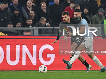 Gianluca Gaetano of Cagliari Calcio and Mario Gila of S.S. Lazio are in action during the 11th day of the Serie A Championship between S.S....