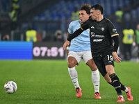 Luca Pellegrini of S.S. Lazio and Nadir Zortea of Cagliari Calcio are in action during the 11th day of the Serie A Championship between S.S....