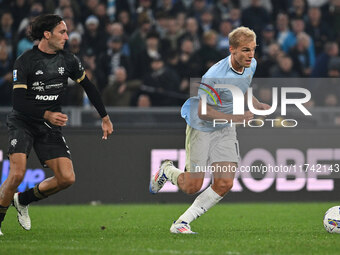 Tommaso Augello of Cagliari Calcio and Gustav Isaksen of S.S. Lazio are in action during the 11th day of the Serie A Championship between S....