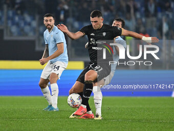 Roberto Piccoli of Cagliari Calcio and Alessio Romagnoli of S.S. Lazio are in action during the 11th day of the Serie A Championship between...