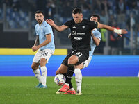 Roberto Piccoli of Cagliari Calcio and Alessio Romagnoli of S.S. Lazio are in action during the 11th day of the Serie A Championship between...