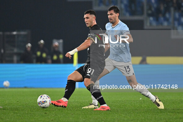 Roberto Piccoli of Cagliari Calcio and Alessio Romagnoli of S.S. Lazio are in action during the 11th day of the Serie A Championship between...