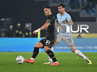 Roberto Piccoli of Cagliari Calcio and Alessio Romagnoli of S.S. Lazio are in action during the 11th day of the Serie A Championship between...