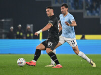 Roberto Piccoli of Cagliari Calcio and Alessio Romagnoli of S.S. Lazio are in action during the 11th day of the Serie A Championship between...