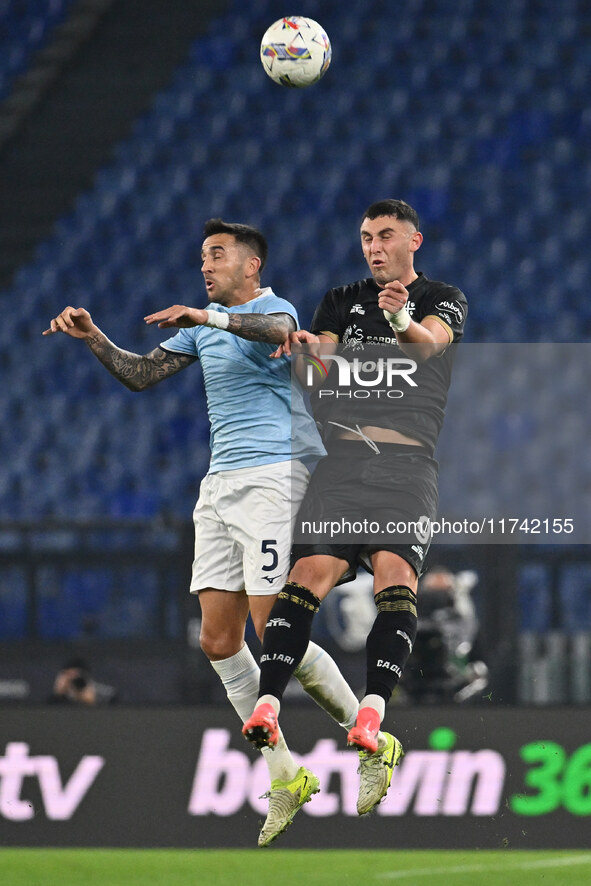 Matias Vecino of S.S. Lazio and Roberto Piccoli of Cagliari Calcio are in action during the 11th day of the Serie A Championship between S.S...