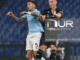 Matias Vecino of S.S. Lazio and Roberto Piccoli of Cagliari Calcio are in action during the 11th day of the Serie A Championship between S.S...