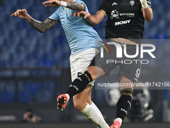 Matias Vecino of S.S. Lazio and Roberto Piccoli of Cagliari Calcio are in action during the 11th day of the Serie A Championship between S.S...