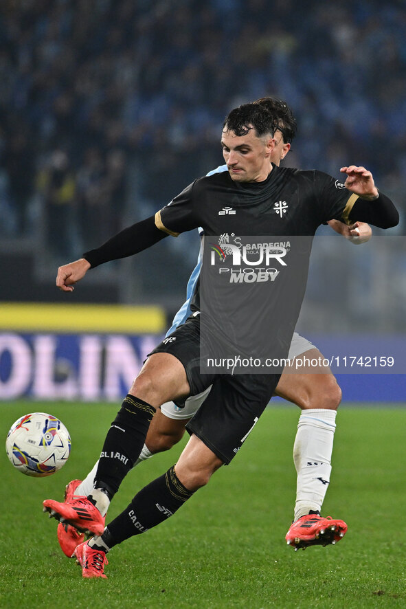 Nadir Zortea of Cagliari Calcio and Luca Pellegrini of S.S. Lazio are in action during the 11th day of the Serie A Championship between S.S....