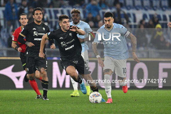 Adam Obert of Cagliari Calcio and Mattia Zaccagni of S.S. Lazio are in action during the 11th day of the Serie A Championship between S.S. L...