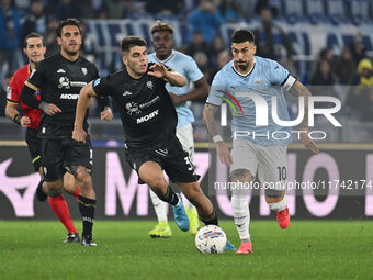 Adam Obert of Cagliari Calcio and Mattia Zaccagni of S.S. Lazio are in action during the 11th day of the Serie A Championship between S.S. L...