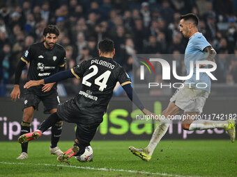 Jose Luis Palomino of Cagliari Calcio and Matias Vecino of S.S. Lazio are in action during the 11th day of the Serie A Championship between...