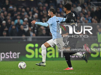 Valentin Castellanos of S.S. Lazio and Jose Luis Palomino of Cagliari Calcio are in action during the 11th day of the Serie A Championship b...