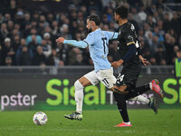 Valentin Castellanos of S.S. Lazio and Jose Luis Palomino of Cagliari Calcio are in action during the 11th day of the Serie A Championship b...