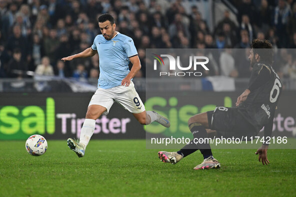 Pedro of S.S. Lazio and Sebastiano Luperto of Cagliari Calcio are in action during the 11th day of the Serie A Championship between S.S. Laz...