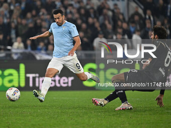 Pedro of S.S. Lazio and Sebastiano Luperto of Cagliari Calcio are in action during the 11th day of the Serie A Championship between S.S. Laz...