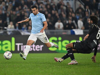 Pedro of S.S. Lazio and Sebastiano Luperto of Cagliari Calcio are in action during the 11th day of the Serie A Championship between S.S. Laz...