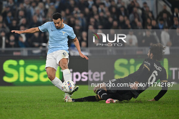 Pedro of S.S. Lazio and Sebastiano Luperto of Cagliari Calcio are in action during the 11th day of the Serie A Championship between S.S. Laz...