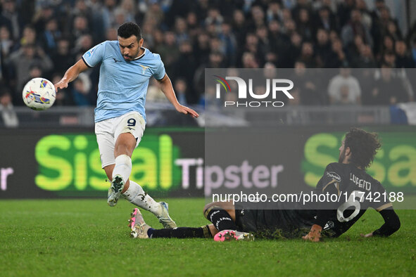 Pedro of S.S. Lazio and Sebastiano Luperto of Cagliari Calcio are in action during the 11th day of the Serie A Championship between S.S. Laz...