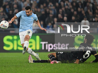 Pedro of S.S. Lazio and Sebastiano Luperto of Cagliari Calcio are in action during the 11th day of the Serie A Championship between S.S. Laz...