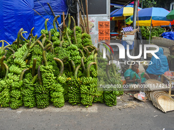 Bunches of unripe bananas are for sale at a marketplace ahead of the Chhath Puja celebration in Kolkata, India, on November 5, 2024. (