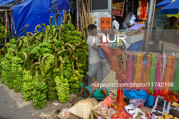 Bunches of unripe bananas are for sale at a marketplace ahead of the Chhath Puja celebration in Kolkata, India, on November 5, 2024. 