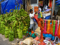 Bunches of unripe bananas are for sale at a marketplace ahead of the Chhath Puja celebration in Kolkata, India, on November 5, 2024. (