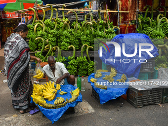 Bunches of unripe bananas are for sale at a marketplace ahead of the Chhath Puja celebration in Kolkata, India, on November 5, 2024. (