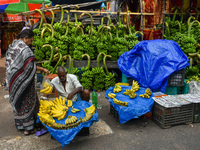 Bunches of unripe bananas are for sale at a marketplace ahead of the Chhath Puja celebration in Kolkata, India, on November 5, 2024. (