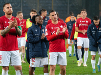 Alan Uryga, James Igbekeme, and Angel Rodado stand after the game between Wisla Krakow and GKS Tychy in Krakow, Poland, on November 4, 2024....