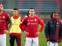 Alan Uryga, James Igbekeme, and Angel Rodado stand after the game between Wisla Krakow and GKS Tychy in Krakow, Poland, on November 4, 2024....