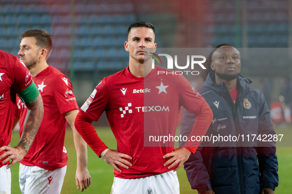 Angel Rodado and James Igbekeme stand together after the game between Wisla Krakow and GKS Tychy in Krakow, Poland, on November 4, 2024. Thi...