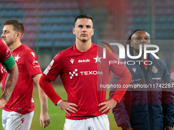 Angel Rodado and James Igbekeme stand together after the game between Wisla Krakow and GKS Tychy in Krakow, Poland, on November 4, 2024. Thi...