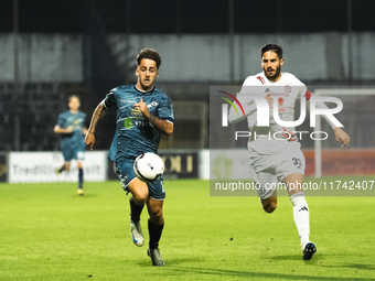 Salvatore Pezzella of Cavese and Luigi Carillo of Foggia participate in the Serie C match between Cavese and Foggia at Stadio Simonetta Lamb...