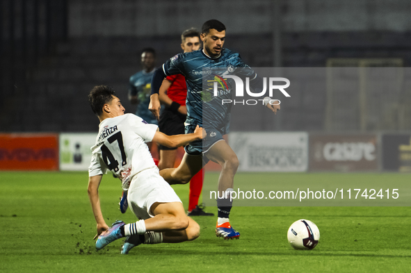 Orazio Pazienza of Foggia and Gaetano Vitale of Cavese participate in the Serie C match between Cavese and Foggia at Stadio Simonetta Lamber...